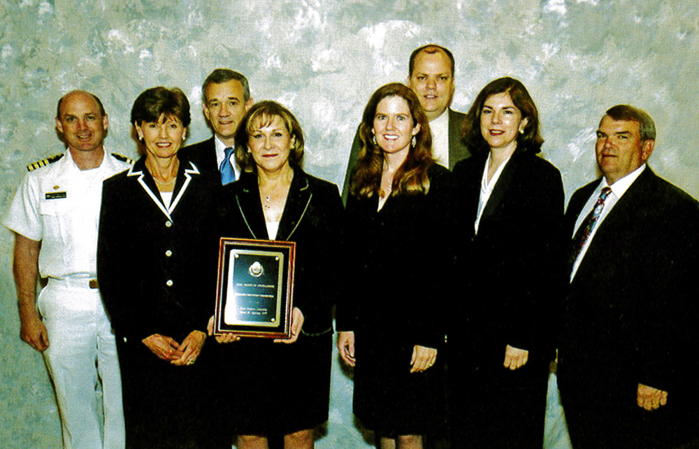 IDSI team receives an award for their technical paper submission at IITSEC 2006.